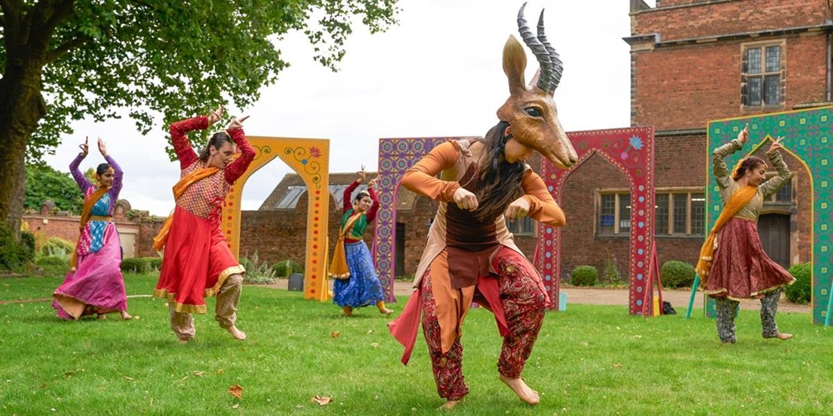 A group performing animal paradise by Mughal Miniatures