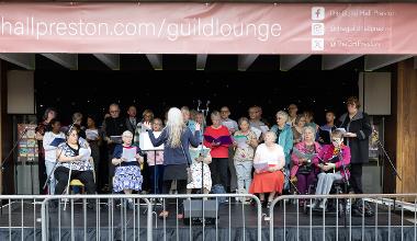 A group of people singing at the 2024 Encounter Festival.