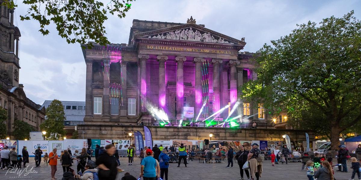 Disco lights in front of the Harris Museum at the 2024 Encounter Festival