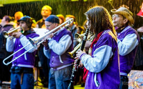 A band playing in the rain