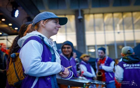 A lady with a drum